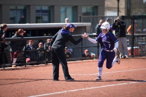 Morgan Nelson rounds third base. The freshman was among Northwestern’s notables in the Iowa series, hitting a home run in the final contest. 