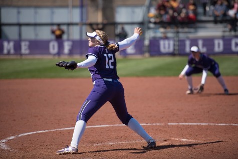Kenzie Ellis fires from the circle. The freshman pitcher pitched in all three games against Iowa this weekend. 
