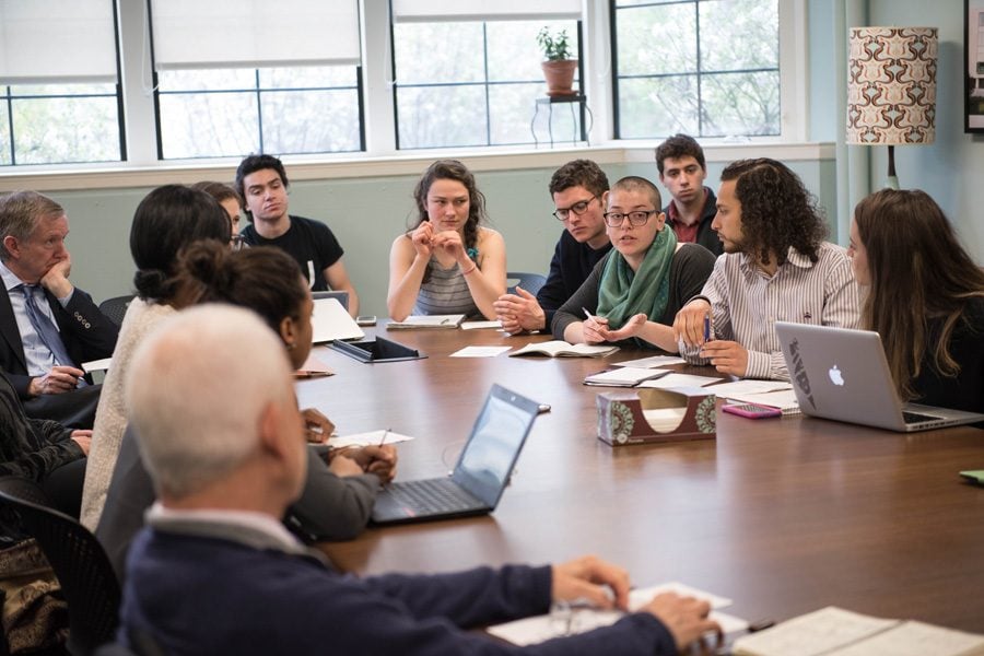 Associated Student Government president Christina Cilento (right) addresses University President Morton Schapiro and student divestment advocates. Thursday’s meeting addressed the possible structure of the socially responsible investment committee.