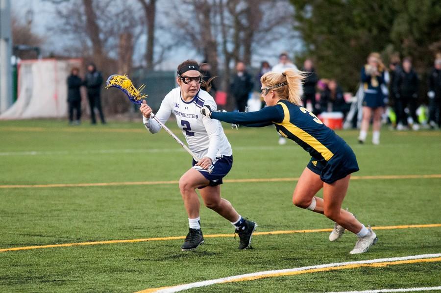 Selena Lasota works her way around a defender. The sophomore midfielder, who had been in a recent slump, tied her career high with 6 goals Thursday night. 