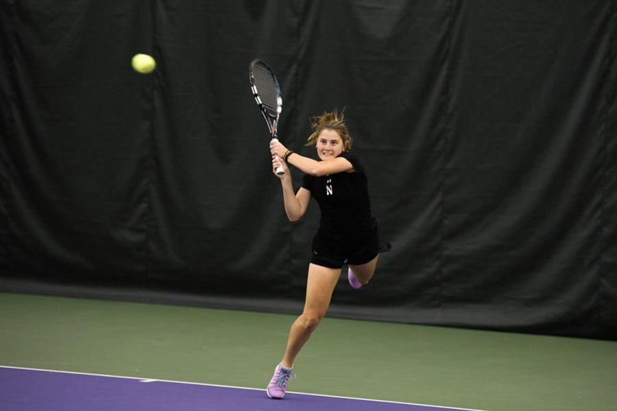Brooke Rischbieth returns the ball. The junior clinched Sunday’s match against Indiana for the Wildcats at No. 5 singles. 