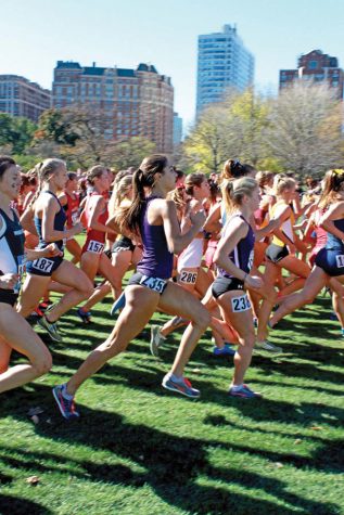 Northwestern runners compete in a cross country event. The Wildcats will be taking part in their first event since April 2 and send four runners to Virginia. 
