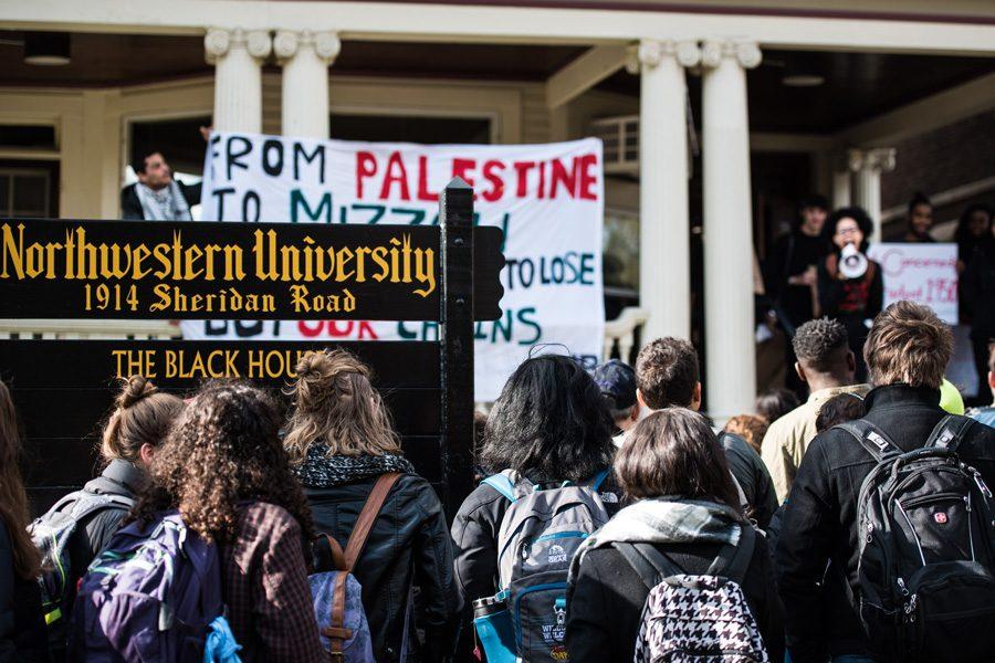 Students gather outside the Black House last November to protest institutional racism and proposed changes to the facility. By the end of Fall Quarter, the proposed changes were dropped and Patricia Telles-Irvin, vice president for student affairs, appointed two committees to evaluate the black student experience at Northwestern. 