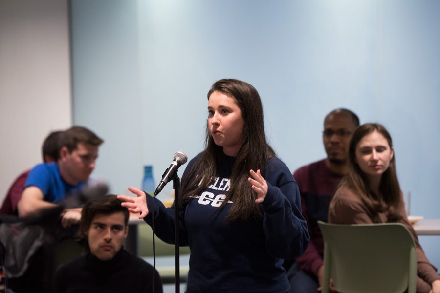 Communication senior Amanda Walsh speaks at Allison Hall on Monday evening. Walsh spoke during the latest community dialogue, at which students shared comments and concerns with top administrators.