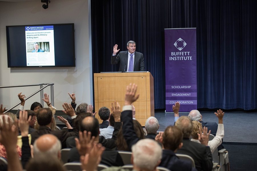 Former ambassador Karl Eikenberry asks the audience to raise their hands if they or a family member have served in the military. Eikenberry spoke about the growing divide between the United States military and the countrys citizens during a talk held Tuesday. 