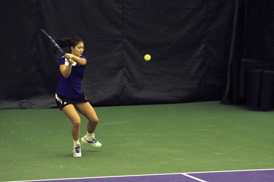 Nida+Hamilton+hits+a+backhand+during+her+time+as+a+student-athlete.+Hamilton+last+played+for+the+Wildcats+in+2014+and+is+now+a+volunteer+assistant+coach.