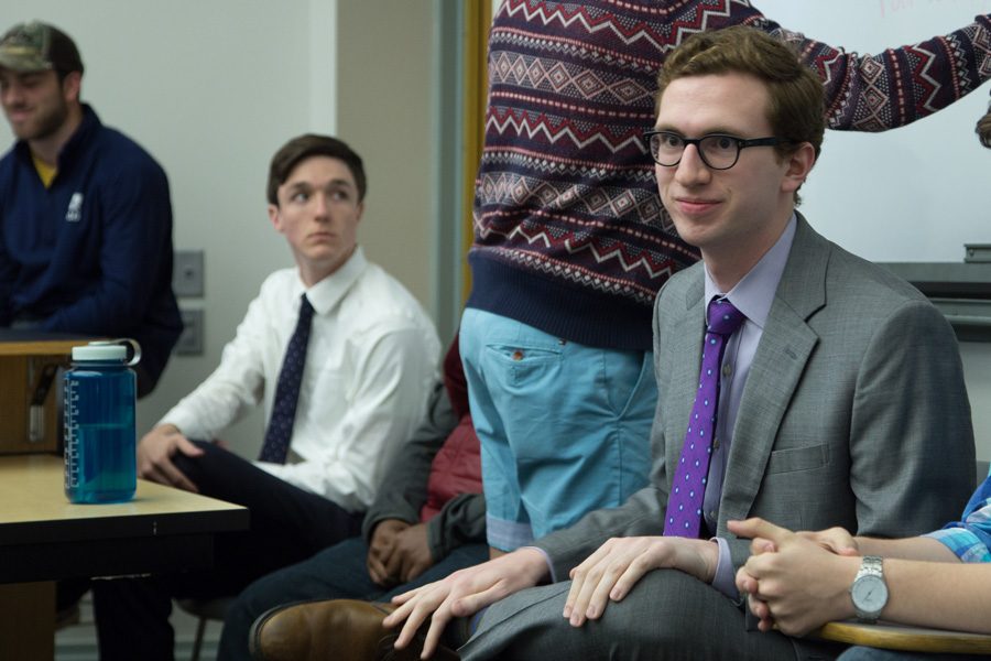 Interfraternity Council president Will Altabef, a Communication junior, answers questions during a forum Monday evening. The IFC executive board hosted the event to discuss student concerns and ideas following the banner controversy.