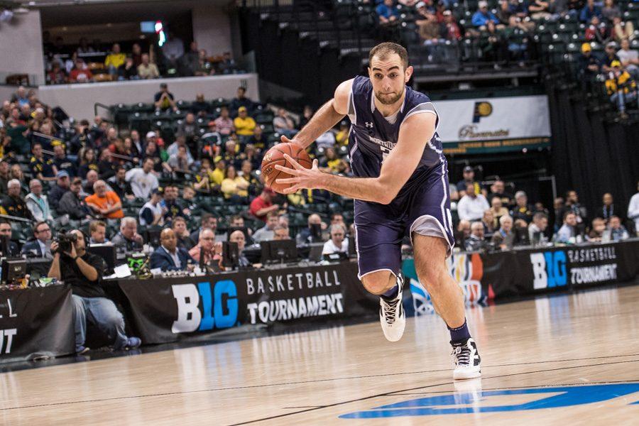 Alex Olah drives down the court. The former NU player and his teammate Tre Demps will be playing together professionally for Belfius Mons-Hainaut in Belgium. 