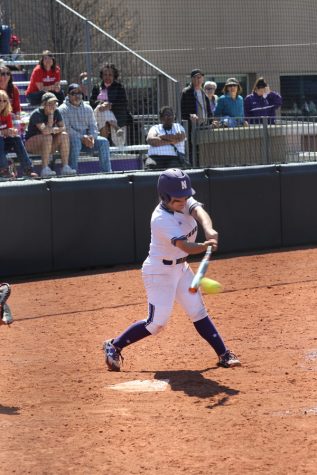 Brooke Marquez makes contact with the ball. The sophomore second baseman was 2-for-3 with an RBI in Friday’s win over Ohio State. 