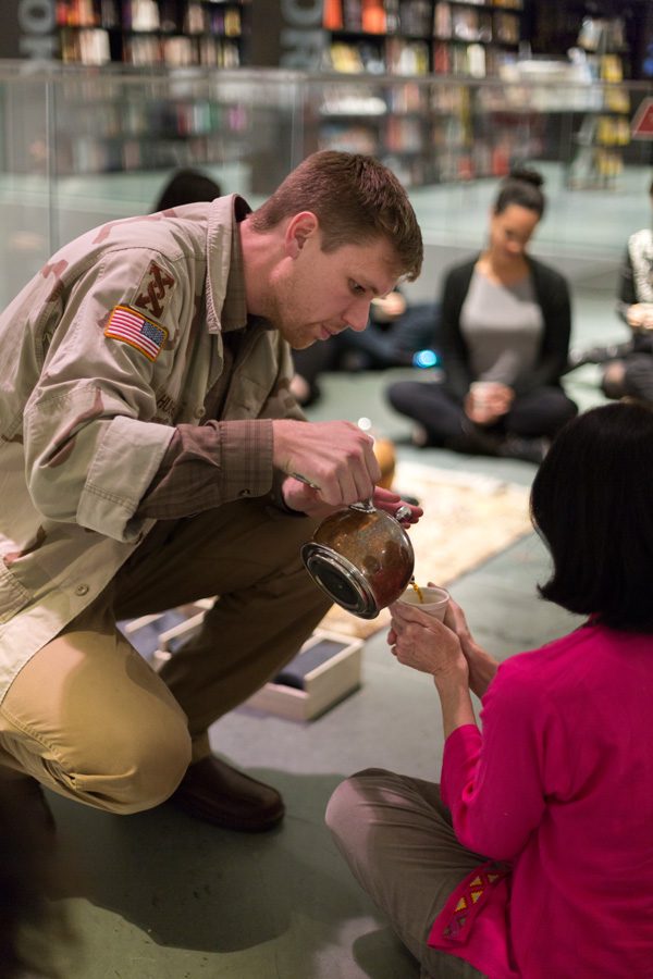 Aaron Hughes (Graduate School ‘09) pours tea as a part of The Tea Project’s tea ceremony performance. Hughes and fellow artist Amber Ginsburg will perform the tea ceremony at the Arts Circle Celebration on June 4. 