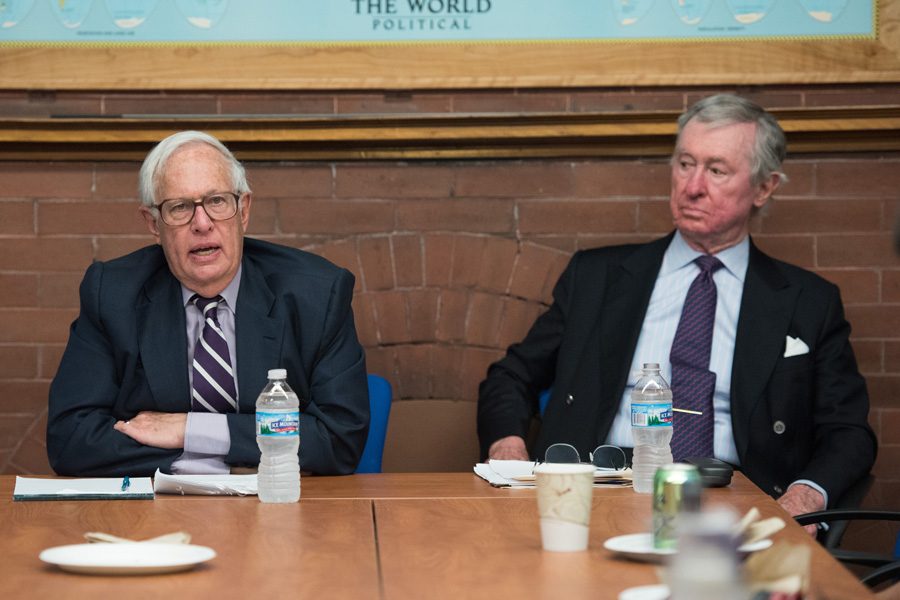 Former Northwestern president Henry Bienen (left) speaks at a Political Union event Monday. Bienen and Political Science Prof. John Rielly, former president of the Chicago Council of Global Affairs, discussed Obama’s foreign policy.