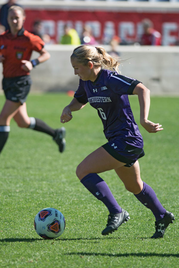 Kassidy Gorman moves forward with the ball. The junior defender scored the game-winning goal for the Wildcats over DePaul, giving Northwestern three wins in as many games.
