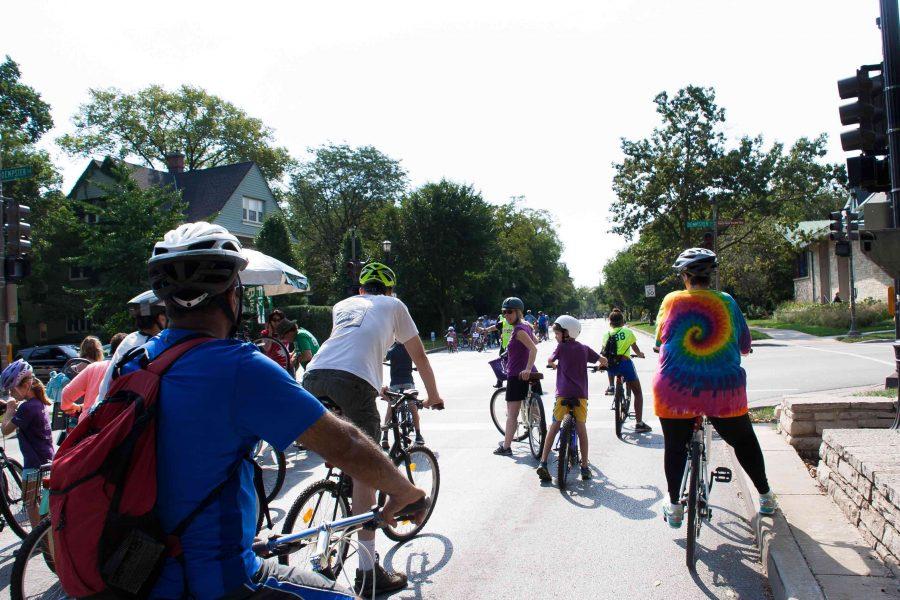 Residents enjoy live music, popsicles and a bouncy house during Bike the Ridge. The Evanston School of Rock performed at the event, which featured food trucks and bike repairs. 