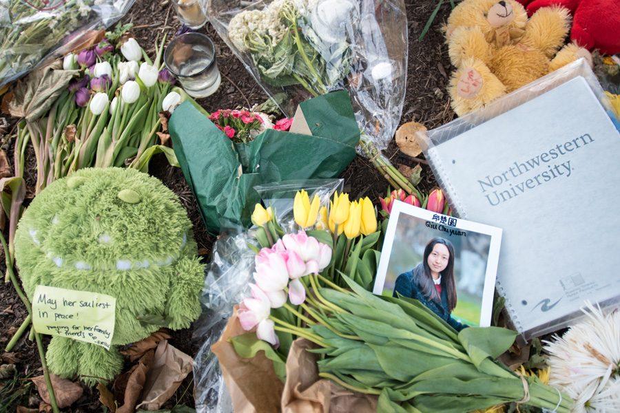 Students leave flowers, stuffed animals and notes as a memorial for Northwestern student Chuyuan “Chu” Qiu who died in a bike accident Thursday. Evanston’s first ward alderman called for lower speed limits on Sheridan Road where the accident occurred.