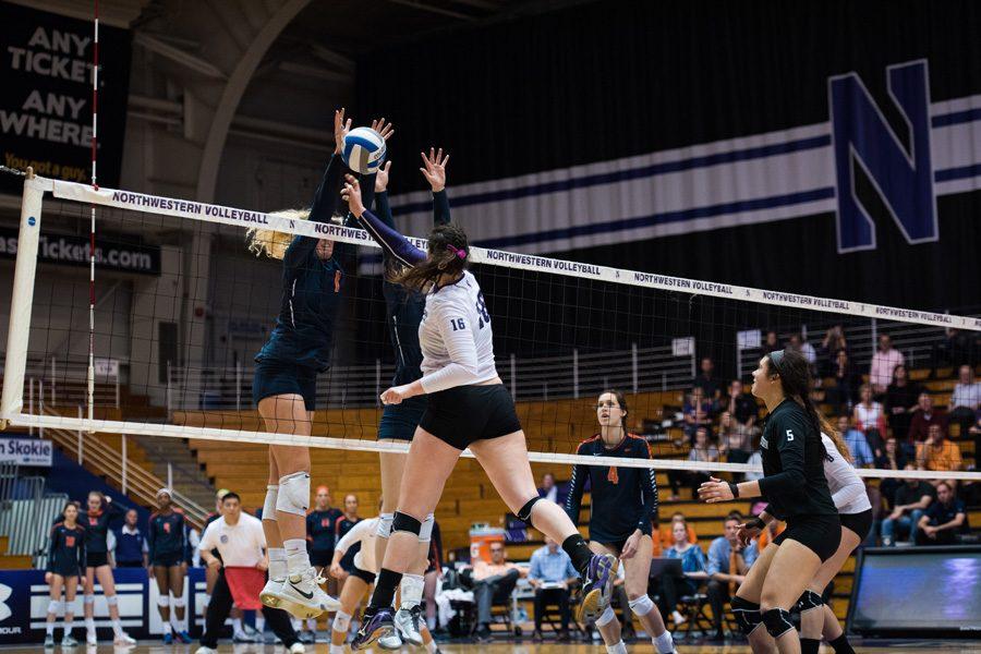 Senior outside hitter Sofia Lavin gets blocked at the net. Northwestern hit well in its game against Indiana but struggled with serving in the four-set defeat.