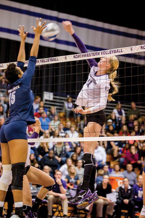 Maddie+Slater+spikes+the+ball.+The+senior+middle+blocker+is+fourth+on+the+Wildcats+in+kills+ahead+of+a+home+matchup+with+Iowa+on+Saturday.