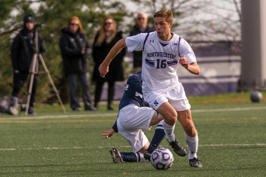 Mike Roberge turns by a defender. The senior forward didnt register a shot as Northwestern struggled to create chances in two defeats over the weekend.