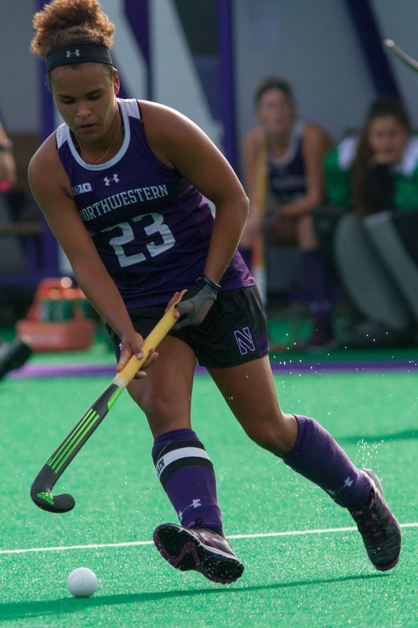 Isabel Flens dribbles the ball. The senior forward, one of the most decorated scorers in school history, is part of a wave of international players coming to Evanston.
