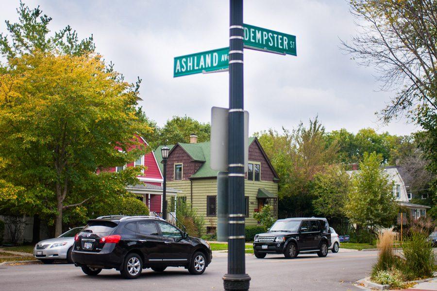 Cars rush past the intersection of Dempster Street and Ashland Avenue. City staff and residents are trying to install a crosswalk at the intersection.