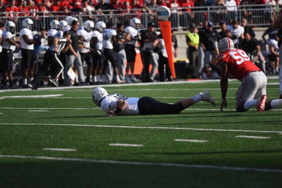Clayton Thorson watches from the ground. The sophomore led Northwestern to a near-upset of No. 6 Ohio State.