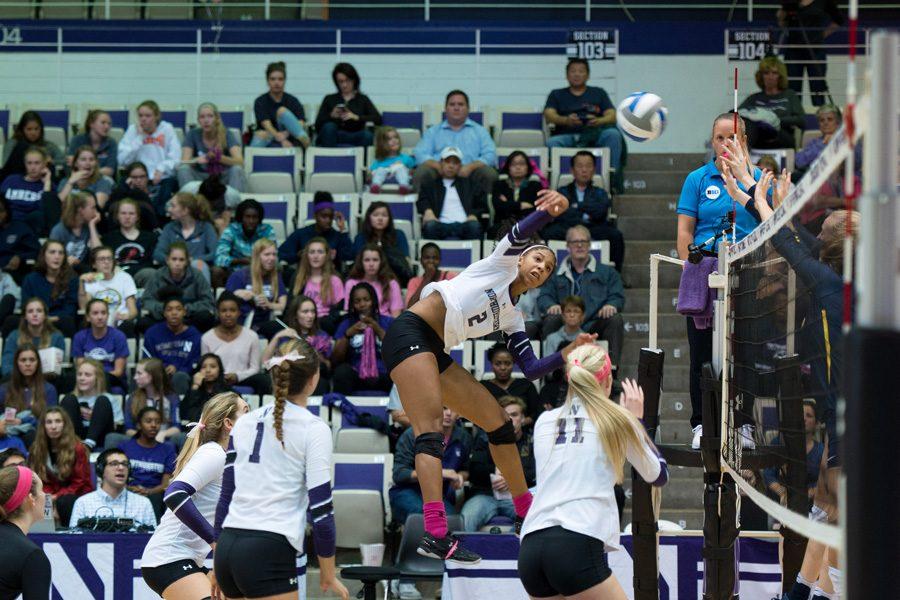 Symone+Abbott+spikes+the+ball.+The+junior+outside+hitter+had+15+kills%2C+but+that+was+not+enough+to+save+Northwestern+from+a+sixth-straight+sweep.