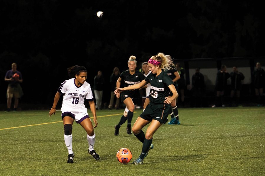 Nandi Mehta tracks an opposing player defensively. The graduate midfielder helped Northwestern to its 11th shutout of the season against Iowa.