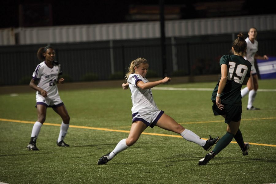 Kassidy Gorman lunges into a tackle. The junior midfielder scored the game-winning goal Thursday against Michigan State.