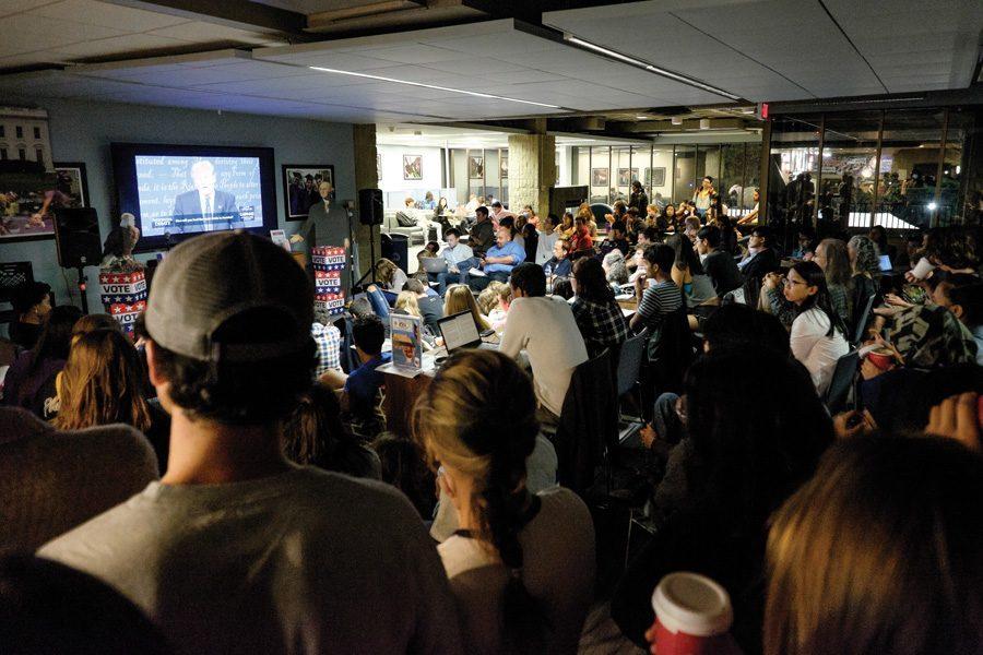 Students gather to watch the 2016 presidential debate. The new model, based on mathematical equations, will help show how populations change their opinions over time as they are exposed to political content such as news media, campaign ads and personal exchanges.

