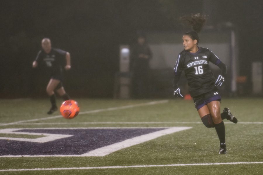Nandi Mehta turns in the midfield. The graduate midfielder and Northwestern will look to begin its NCAA Tournament run with a win Saturday against Kent State.