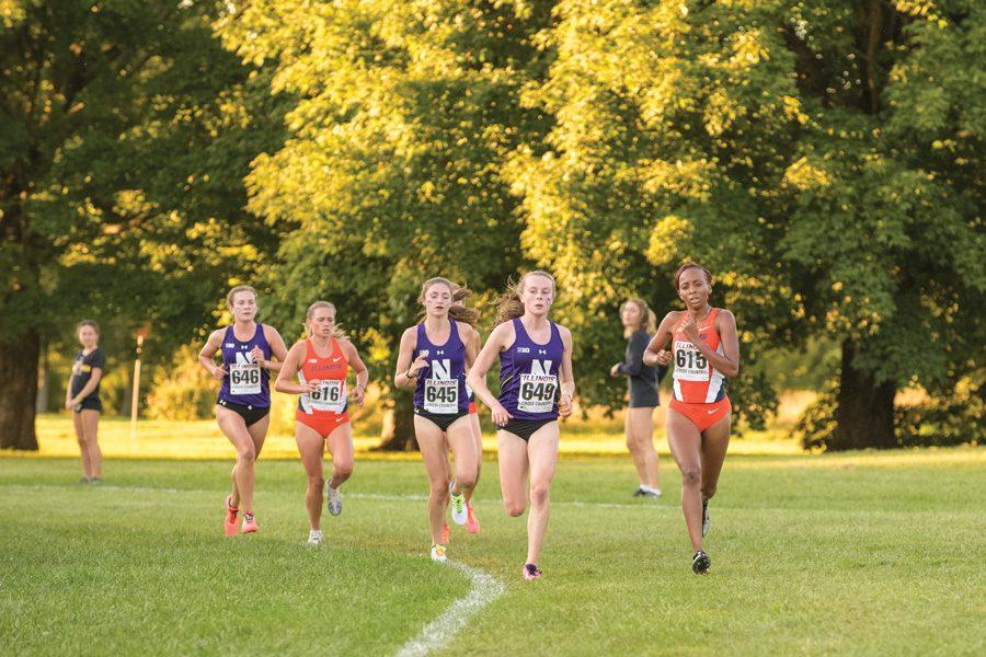 Sarah Nicholson (left-center) and Aubrey Roberts (right-center) round a turn. The two freshmen again led the way for Northwestern at the Big Ten Championships, where the team finished ninth overall.