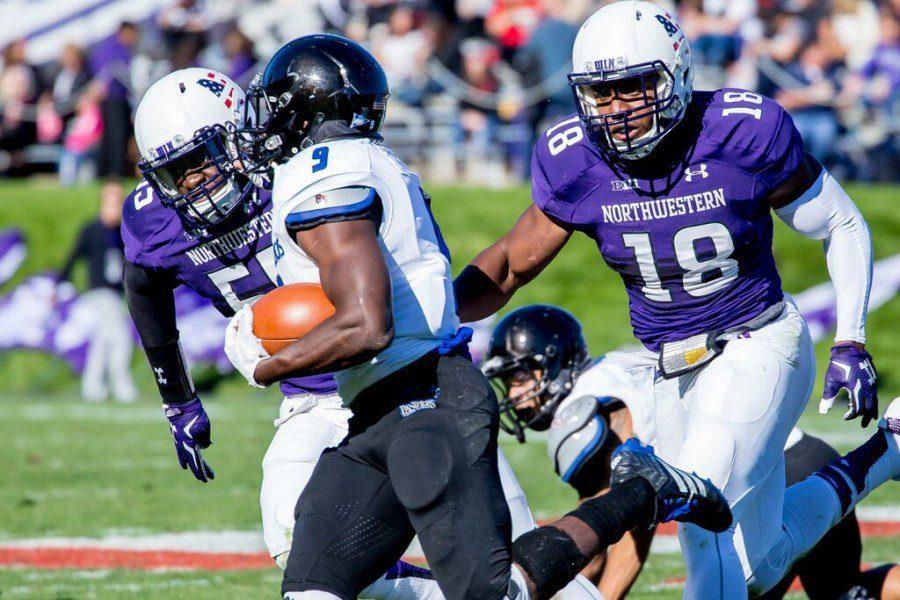 Anthony Walker (18) chases a ball-carrier during Northwesterns win over Eastern Illinois. The sophomore linebacker recorded seven tackles in the game, bringing his season total to a team-leading 17.