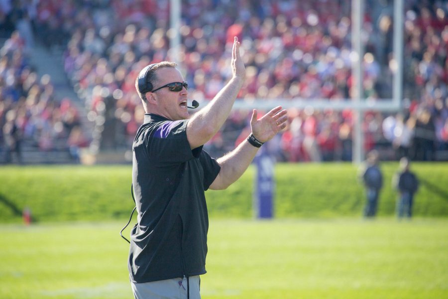 Pat Fitzgerald coaches from the sideline. Fitzgeralds team will have its hands full against No. 23 Pittsburghs potent offense in the Pinstripe Bowl.