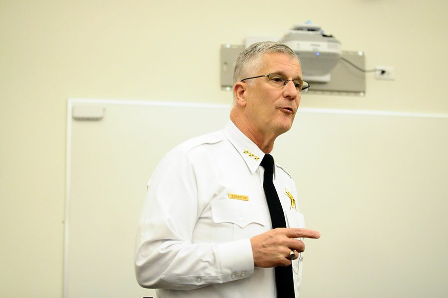 Evanston Police Chief Richard Eddington talks at a community event. Eddington said Thursday one officer had been reprimanded after the investigation into the arrest of Devon Reid and the other officer had retired. 