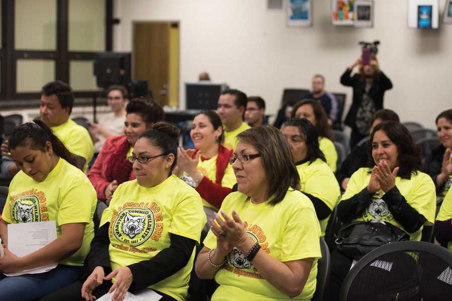 (Katie Pach/Daily Senior Staffer) Parent volunteers from the Latino Advisory Committee at the Evanston Township High School District 202 board meeting. They gathered to show their gratitude to the board for passing the “safe haven” resolution. 
