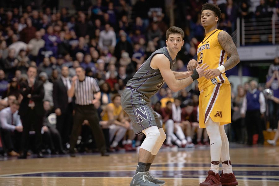 Bryant McIntosh plays defense. The guard’s slow start has hurt Northwestern but provides the team with room for improvement.