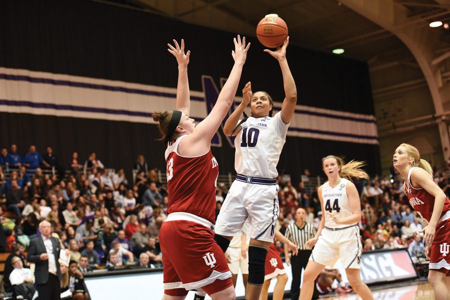 Nia Coffey rises for a shot. The senior forward made just 6-of-20 shots against Michigan.