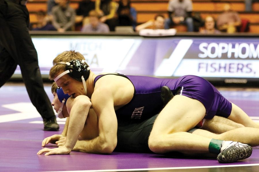 Mitch Sliga pins an opponent. The junior will look to lead his team against a Michigan lineup headlined by a former teammate.