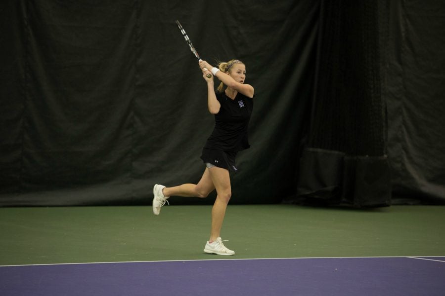 Maddie Lipp follows through a backhand. The junior’s tiebreak loss to Duke solidified the Wildcats’ loss Sunday.
