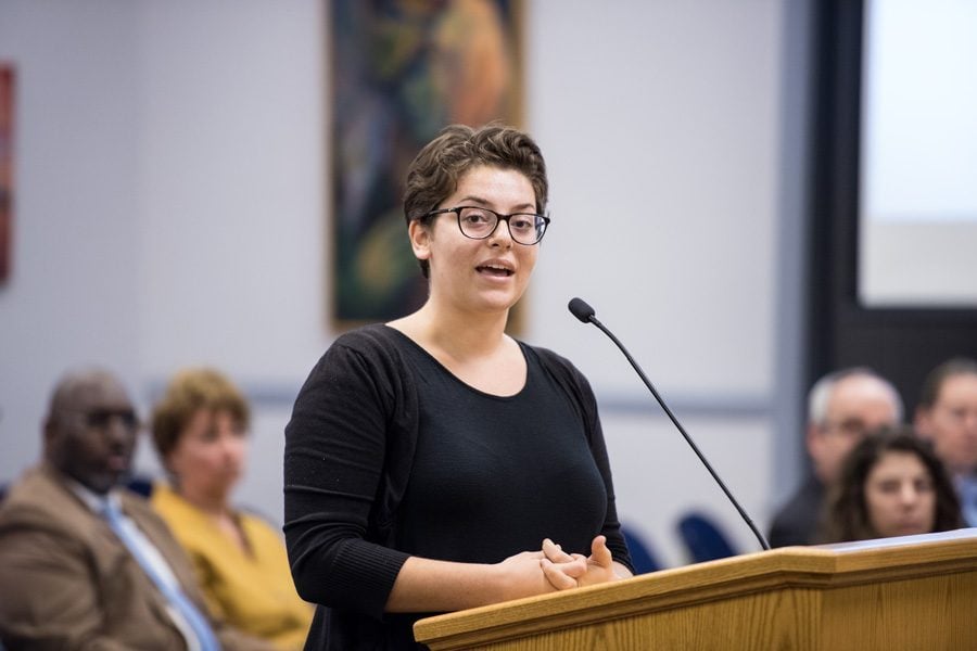 (Daily file photo by Colin Boyle) Associated Student Government President Christina Cilento addresses aldermen, the mayor and city staff in October. ASG held a community dialogue in November on a proposed social inequalities and diversity course requirement.