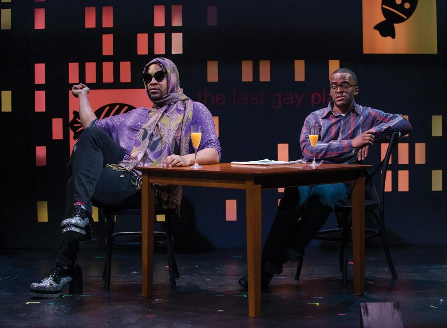 Osiris Khepera and alumnus Travis Turner (Communication ’05) are seated across from each other in “Bootycandy.” Turner said he hopes the show provokes the audience to discuss the issues presented within the play.