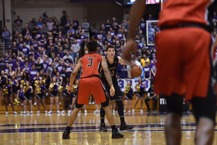 Bryant McIntosh sets up a half-court possession. The junior guards late heroics lifted Northwestern over Rutgers on Saturday.