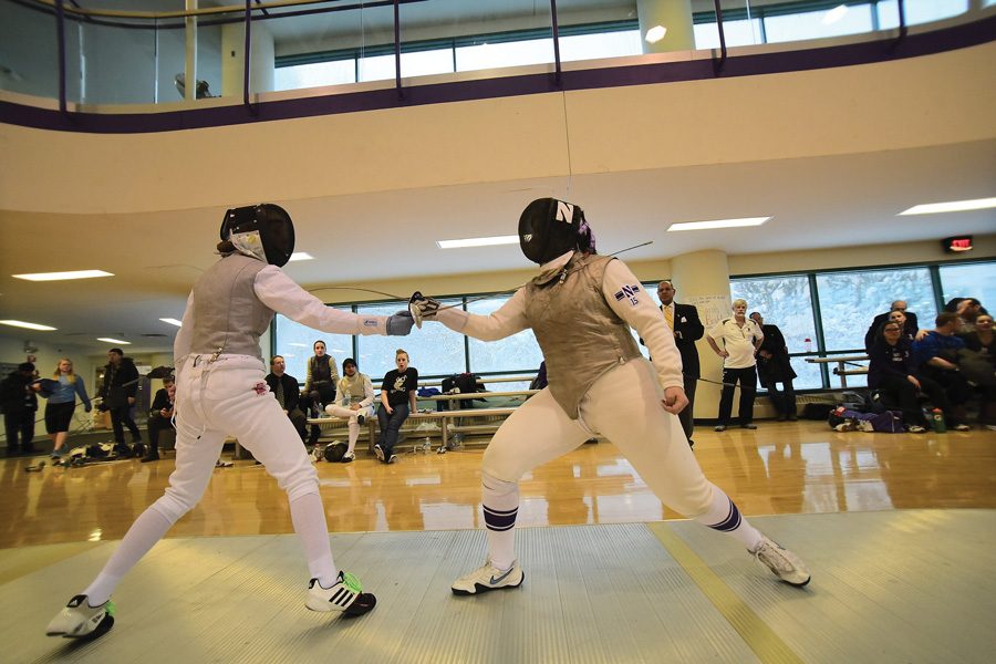 Senior Kimmy Fishman fences against an opponent. Fishman is one of 11 seniors for NU, which hosted its Senior Day in South Bend this weekend.