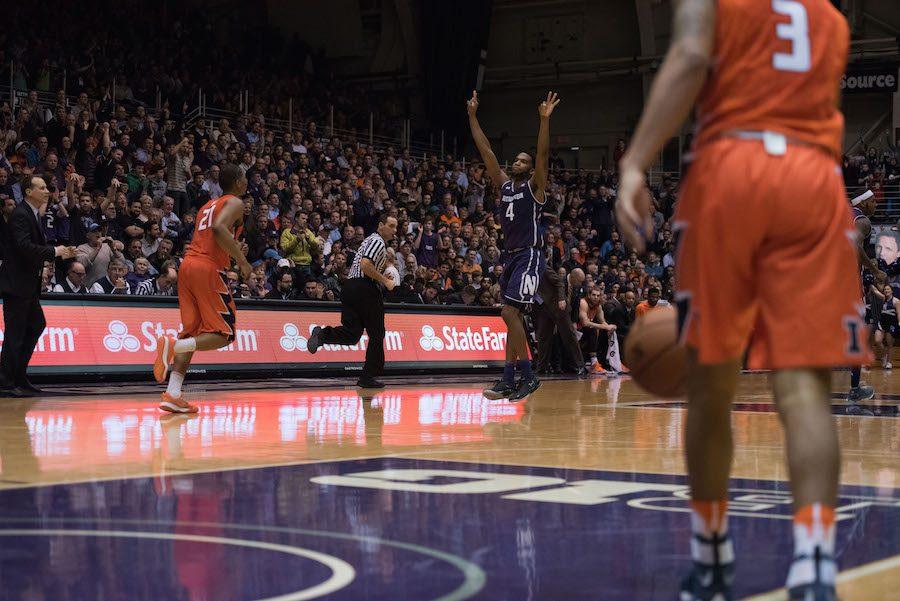 Vic+Law+celebrates+a+3.+The+sophomore+forwards+defensive+effort+helped+lead+Northwestern+over+No.+7+Wisconsin.