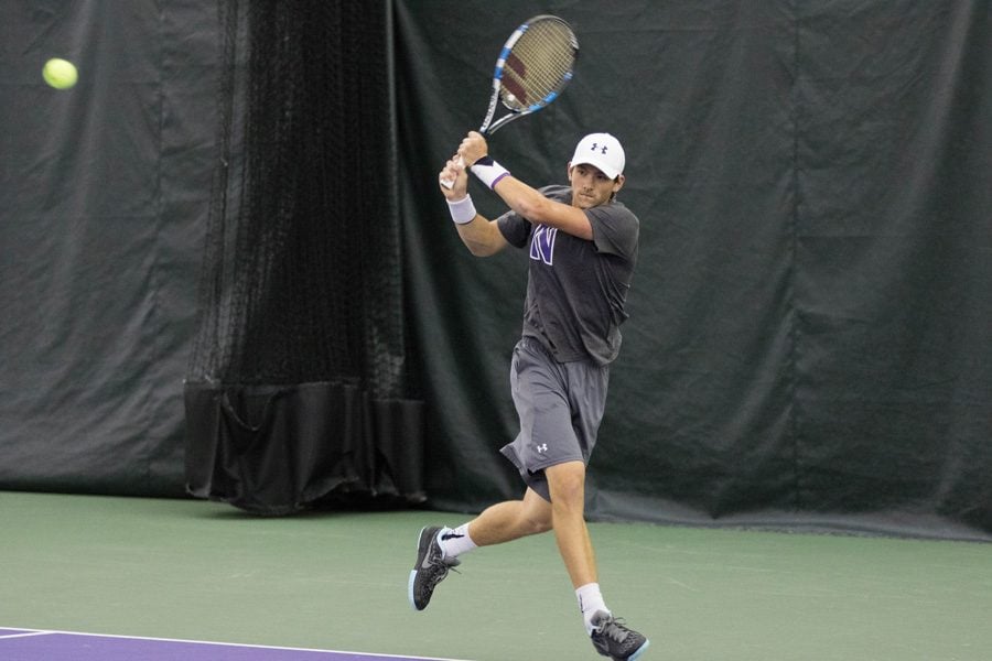 Strong Kirchheimer fires a backhand. The senior said he was disappointed by Northwestern’s two losses this weekend.