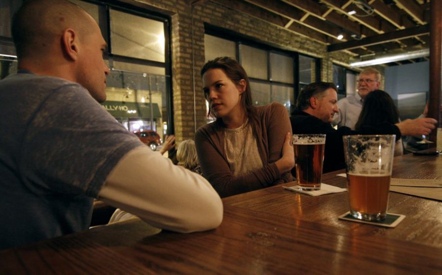 Customers drink a beer at Peckish Pig, 623 Howard St. The management of the pub decided to close down on Thursday for the day without immigrants protest. 
