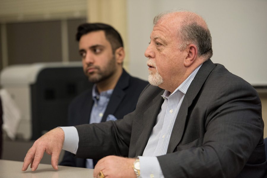 Dr. Mufaddal Hamadeh and Sufyan Sohel speak at a roundtable discussion about Syrian refugee health. The event was organized by GlobeMed at Fisk Hall on Monday.