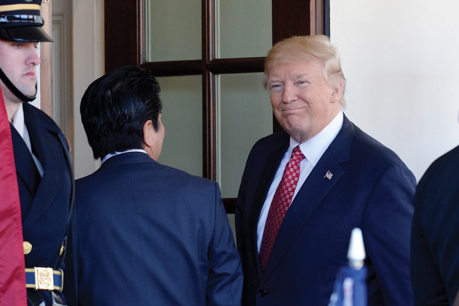 U.S. President Donald Trump welcomes Japanese Prime Minister Shinzo Abe at the White House on Feb. 10, 2017 in Washington, D.C. The Cook County Board of Commissioners passed a resolution this week asking the federal government for help in violence reduction efforts in Chicago.  