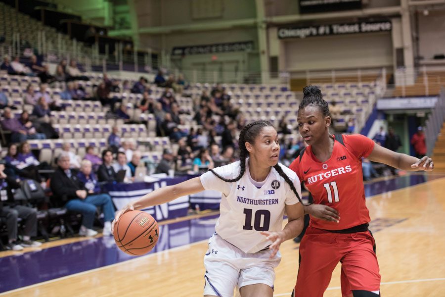 Nia+Coffey+drives+toward+the+hoop.+The+senior+forward+scored+27+points+in+the+Wildcats+win+over+Rutgers.+