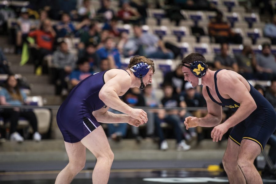 Jacob Berkowitz squares off with an opponent. The senior recorded a pair of wins in the Wildcats’ split weekend.