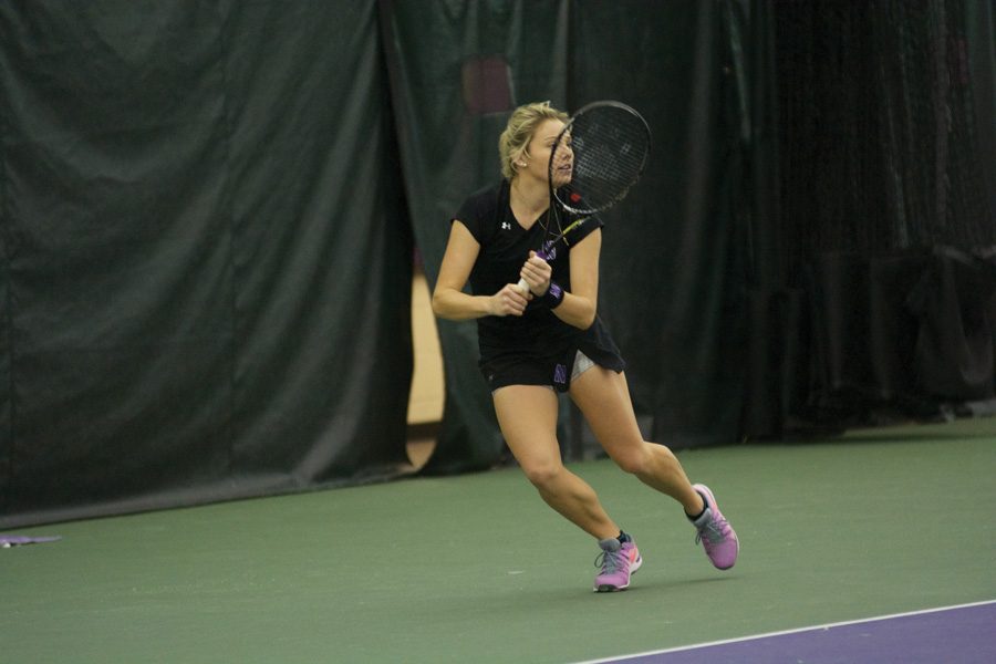 Alex Chatt looks to return the ball. The junior is undefeated at No. 5 singles this season. 